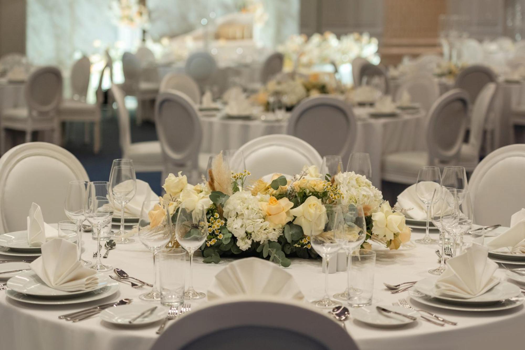 So/ Uptown Dubai Hotel Bagian luar foto A table set for a formal dinner